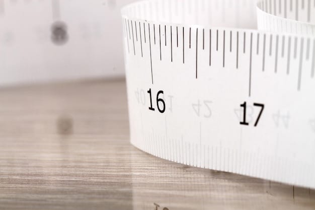 A close-up of a measuring tape showing inch and centimeter markings. The background is blurred, highlighting the importance of accurate measurement.