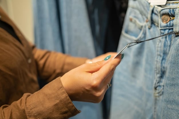 A close-up shot of a person carefully inspecting a piece of clothing for damages before listing it on Shopee. The focus is on the detail-oriented approach to ensure quality.