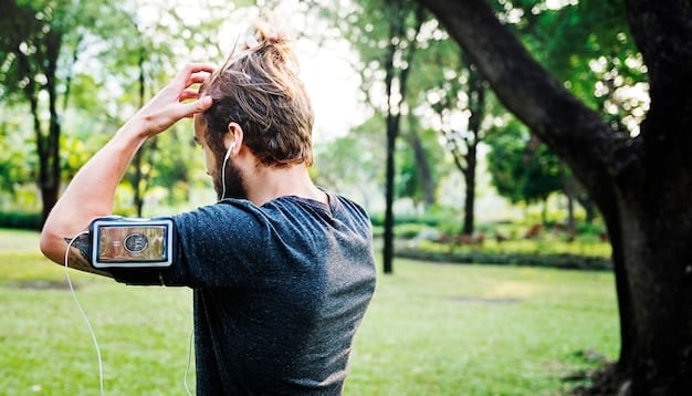A person wearing an Apple Watch during a run, displaying heart rate data on the screen. The background shows a scenic running trail with greenery.