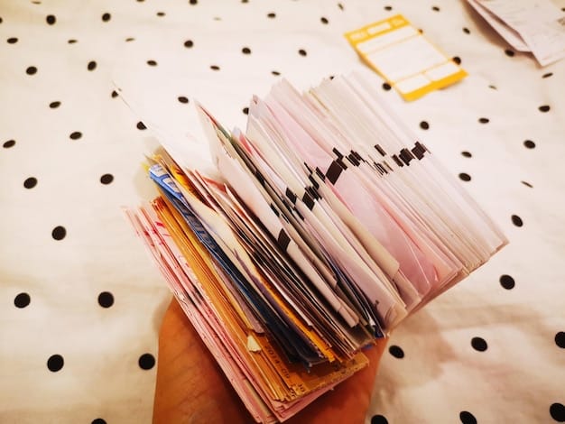 A close-up shot of different coupons being organized in a binder, along with various beauty product flyers. The coupons are a mix of paper and printed digital coupons, all neatly categorized.