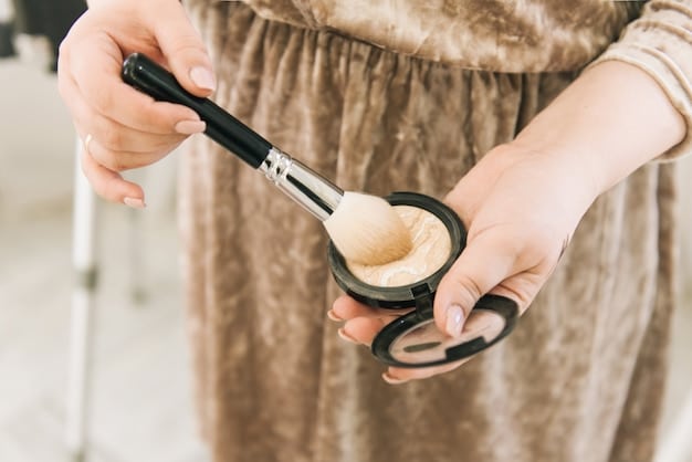 A close-up of hands applying foundation to a face using a makeup brush, demonstrating the proper technique for even application. Focus on the skin texture and the blending process, showing a smooth transition between the makeup and the skin.