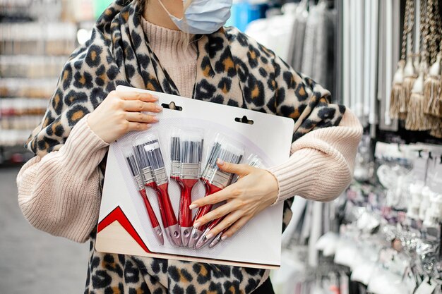 A well-organized makeup display in a department store, showcasing various products from different brands. The display is clean and inviting, with testers available for customers.