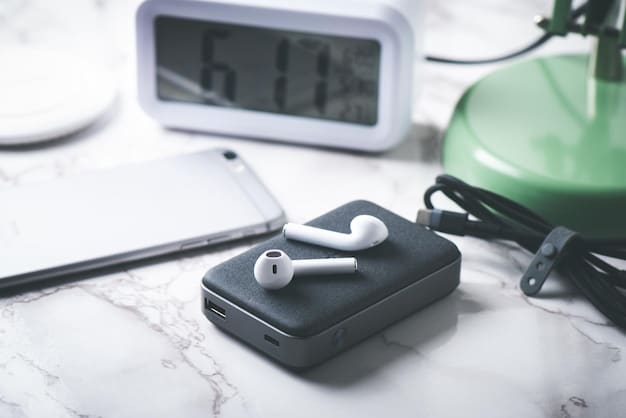 A sleek charging case for noise-canceling headphones, next to a USB-C cable and a portable power bank, emphasizing travel and convenience.