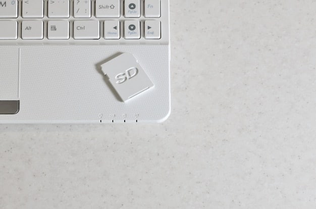 A close-up, top-down view of a sleek laptop keyboard and trackpad. Backlighting illuminates the keys, and the trackpad shows off its precision surface, emphasizing the tactile and responsive design.