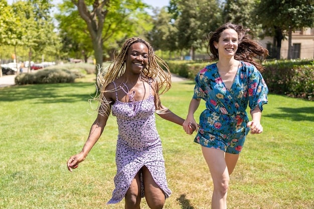 A diverse group of plus-size friends enjoying a picnic in a park, all wearing stylish and comfortable summer outfits from Shein's latest collection, laughing and interacting naturally.