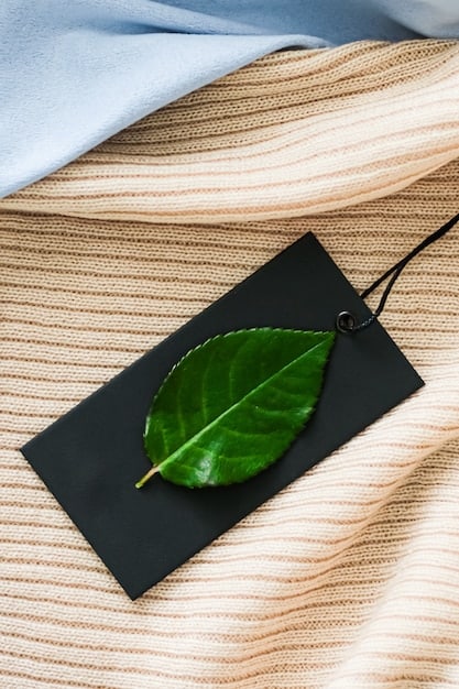 A close-up of a garment label within the EvoluSHEIN range, clearly showing a tag indicating recycled materials or sustainable sourcing, set against a backdrop of soft, natural lighting.