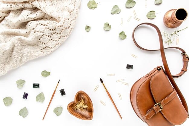 A flat lay image of a curated Shein outfit including a top, bottom, and complementary accessories like a belt and small handbag, illustrating how items are styled together for a perfect look.