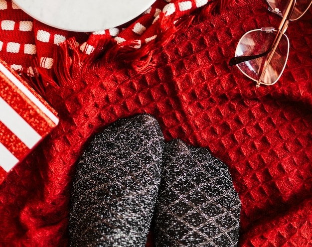 A flat lay of three different Shein coats: a chic houndstooth blazer, a puffy cropped faux leather jacket, and a long, flowing wool blend trench coat, arranged artfully to showcase textures and styles.
