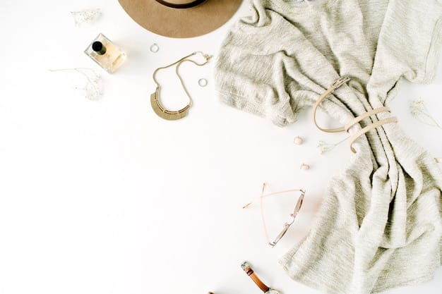 A detailed flat lay of various Shein garments and accessories on a stylish backdrop, with a phone displaying a shopping cart total that has a noticeable reduction from a student discount applied, showcasing the direct benefit of savings.