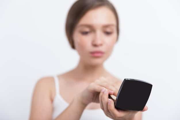 A close-up of a smartphone screen displaying a Shein coupon code being applied at checkout, with the 
