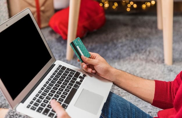 A person's hand holding a credit card over a laptop keyboard, with the Shein checkout page visible on the screen. The focus is on the coupon code entry field, suggesting a typical online shopping scenario.