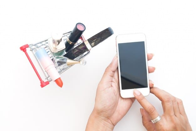A person holding a smartphone showing a Shein cart with multiple items, and a hand pointing to a section for 'coupon/promo code' on the screen, indicating a point of interaction. The setting is bright and casual.