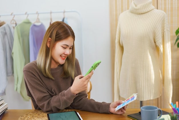 A young woman meticulously adding various clothing items to her online shopping cart on Shein, with a budget calculator visible on her other screen. She is focused on selecting versatile pieces.