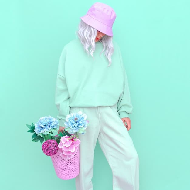 A stylish model wearing a blend of vintage and modern Shein pieces, showcasing a pastel-colored 70s-inspired blouse paired with sleek, contemporary high-waisted trousers, against an urban backdrop during a sunny day.