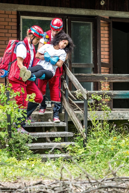 A family practicing a fire drill, exiting their home through a designated escape route, highlighting the importance of preparedness and planning for home fire safety: prevention tips and emergency preparedness for 2025.