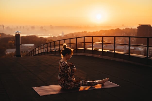 A serene scene of someone practicing yoga and meditation outdoors during sunset.