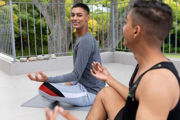 An individual participating in a guided yoga session, focusing on mindful movement and deep breathing exercises, as a holistic approach to Managing Chronic Pain: Effective Strategies for US Residents in 2025. The setting is a bright and airy studio, promoting relaxation and well-being.