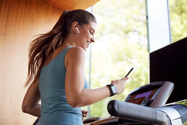 A person is using a fitness tracker while walking on a treadmill. Details of the tracker screen are visible and show heart rate and calories burned during The Power of Walking: How 30 Minutes a Day Can Transform Your Health.