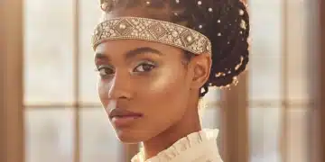 Woman with trendy braided hair wearing pearl clips and an embellished headband, showcasing 2026 hair accessory styles.