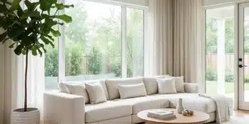 Modern minimalist living room with sparse furniture and natural light in a US home.