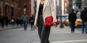 Woman in tailored blazer showcasing accessible high fashion street style.
